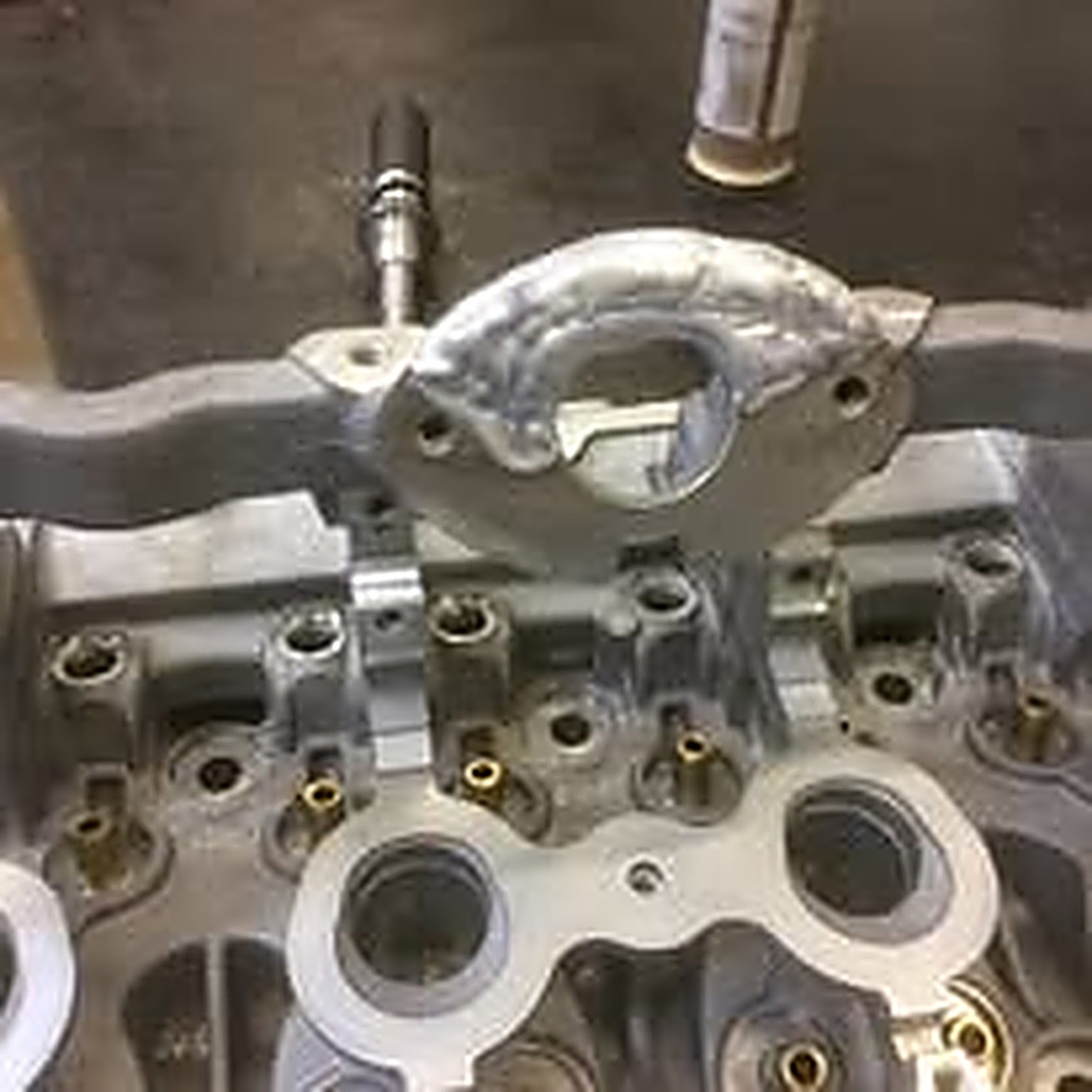 Pièce réparée par soudure TIG aluminium, avant remontage, atelier MoteK